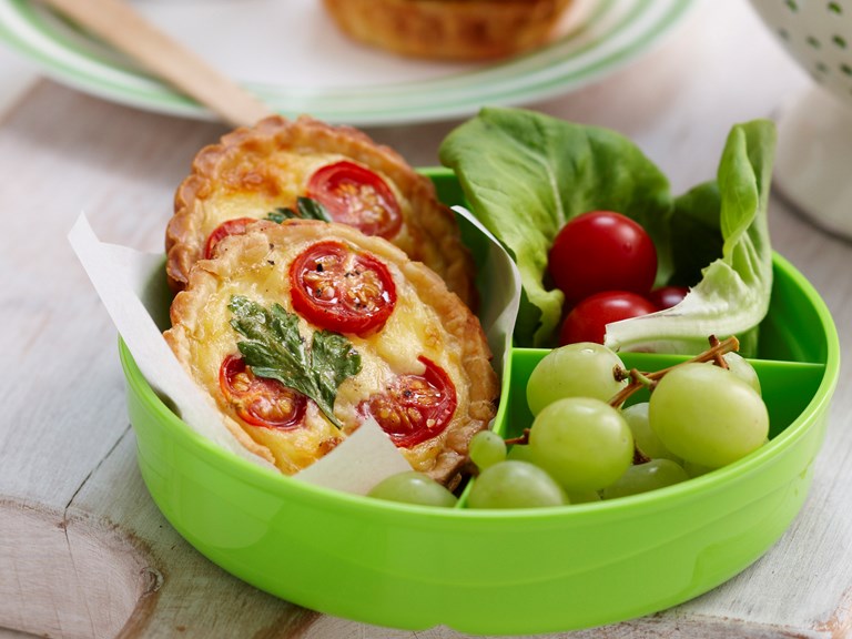 mini cherry tomato and cheese quiches with