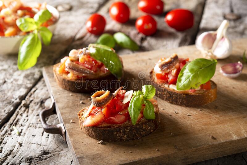 bruschetta with onion marmalade anchovies and olives